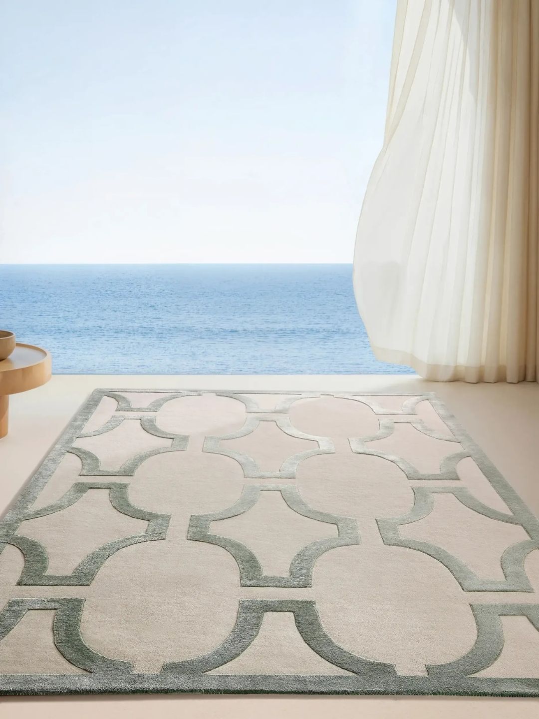 Crèmekleurig wollen vloerkleed woonkamerontwerp