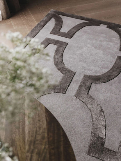 Crèmekleurig wollen vloerkleed woonkamerontwerp