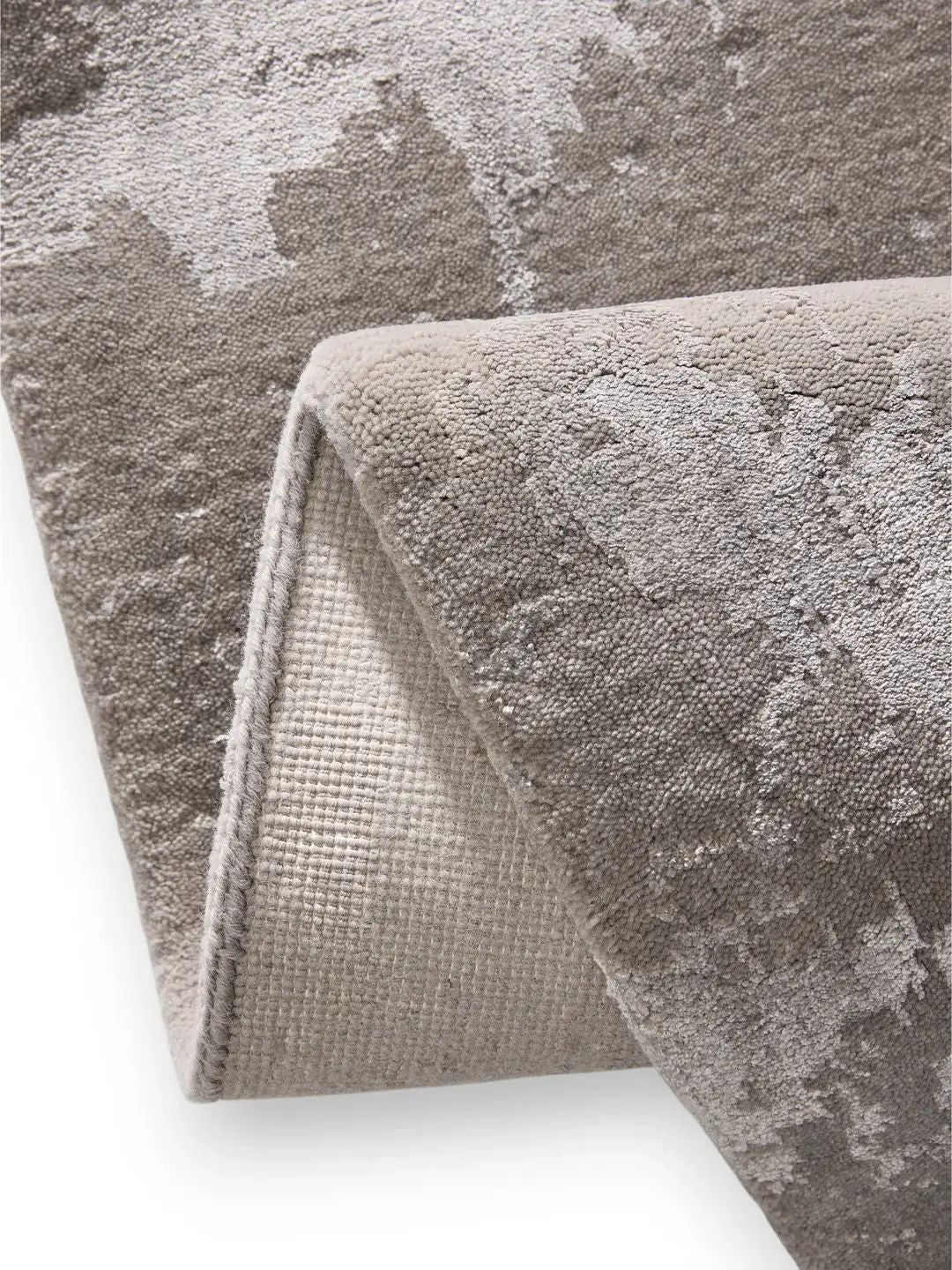 Grijs viscose vloerkleed woonkamer