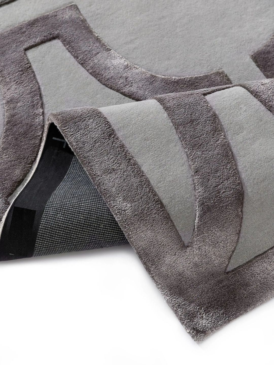 Crèmekleurig wollen vloerkleed woonkamerontwerp