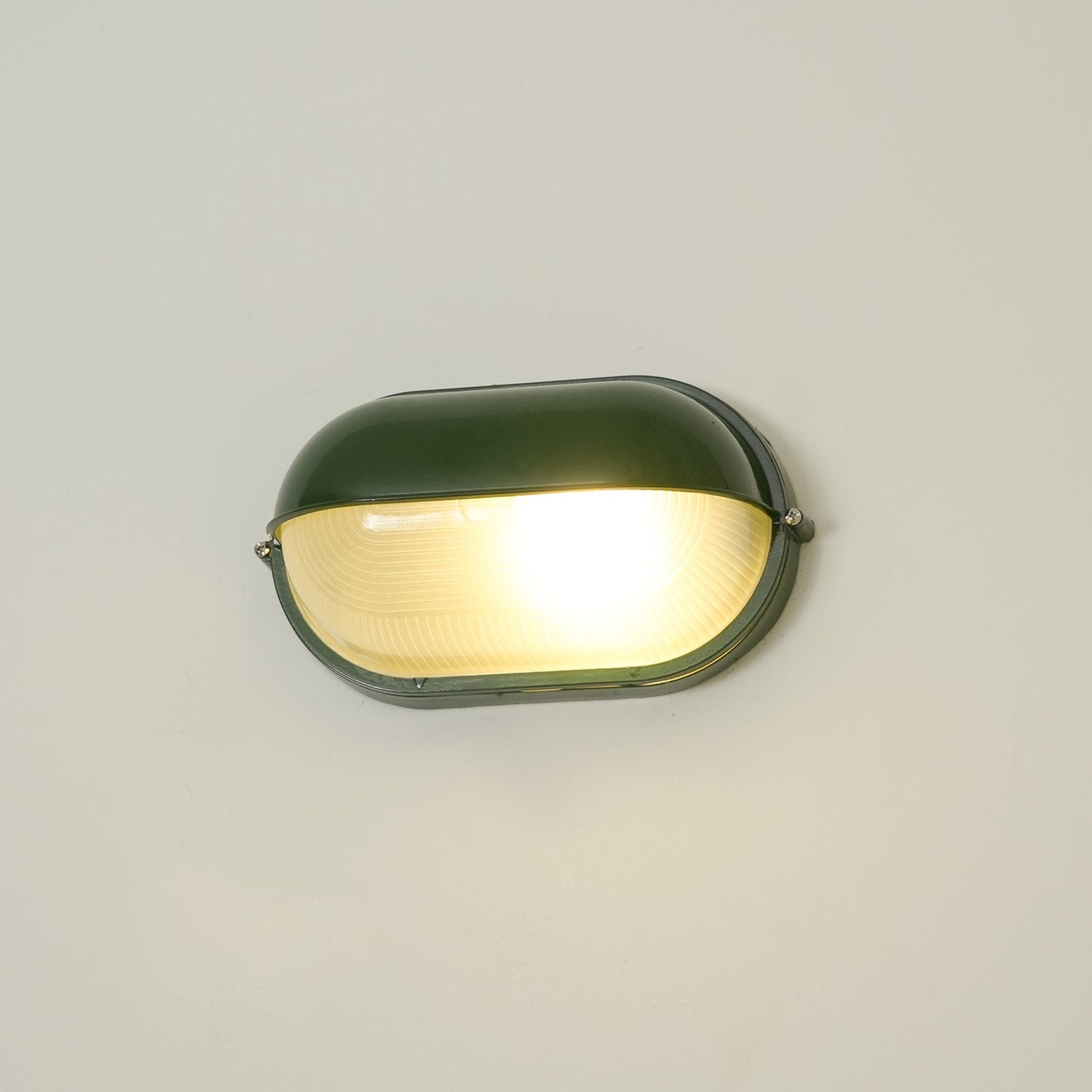Industriële buitenmuurlamp met geribbeld glas
