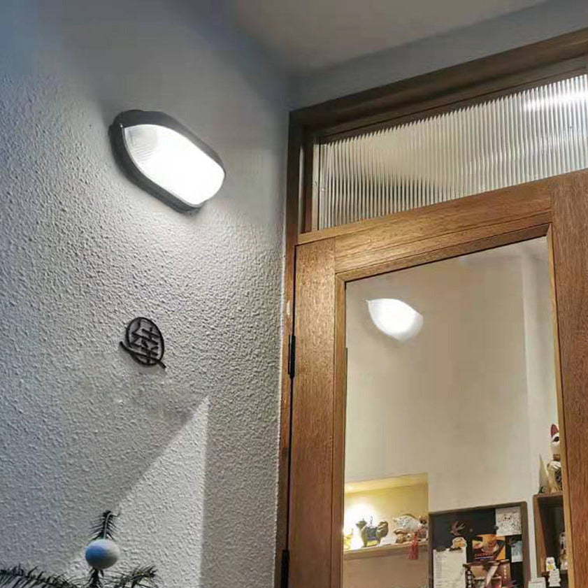 Industriële buitenmuurlamp met geribbeld glas
