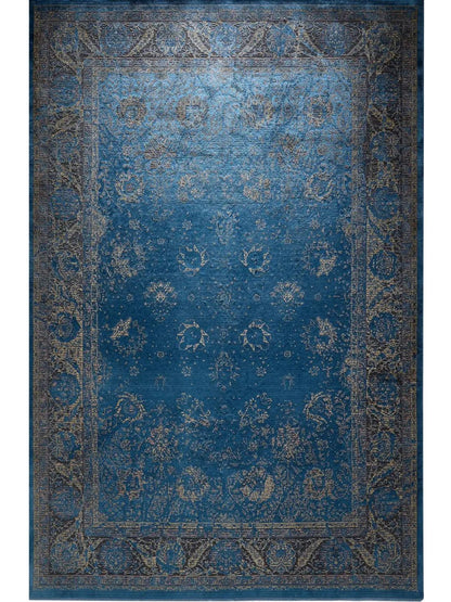 Blauwe vintage vloerkleed woonkamer