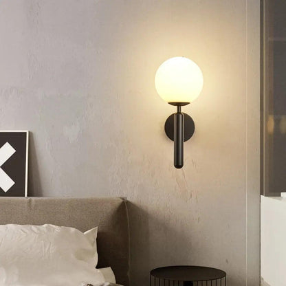 Ophira moderne wandlamp met glazen bol