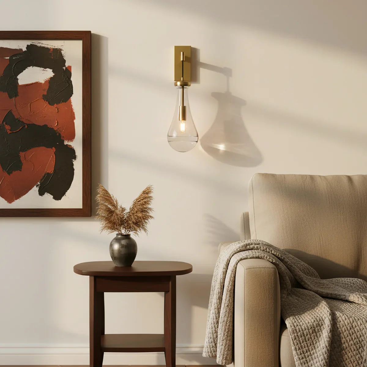 Wandlamp van traanvormig glas