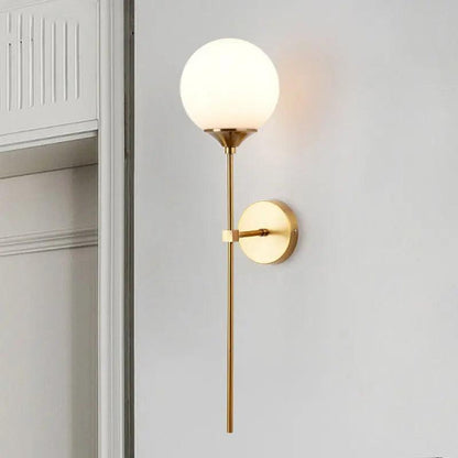 Velmira mid-century wandlamp met glazen bol