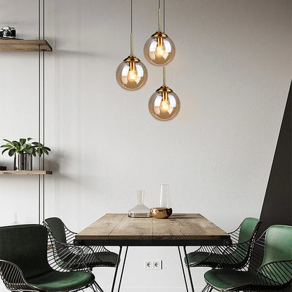 Orbelle Art-decoglazen hanglamp met messing bolvormige kap