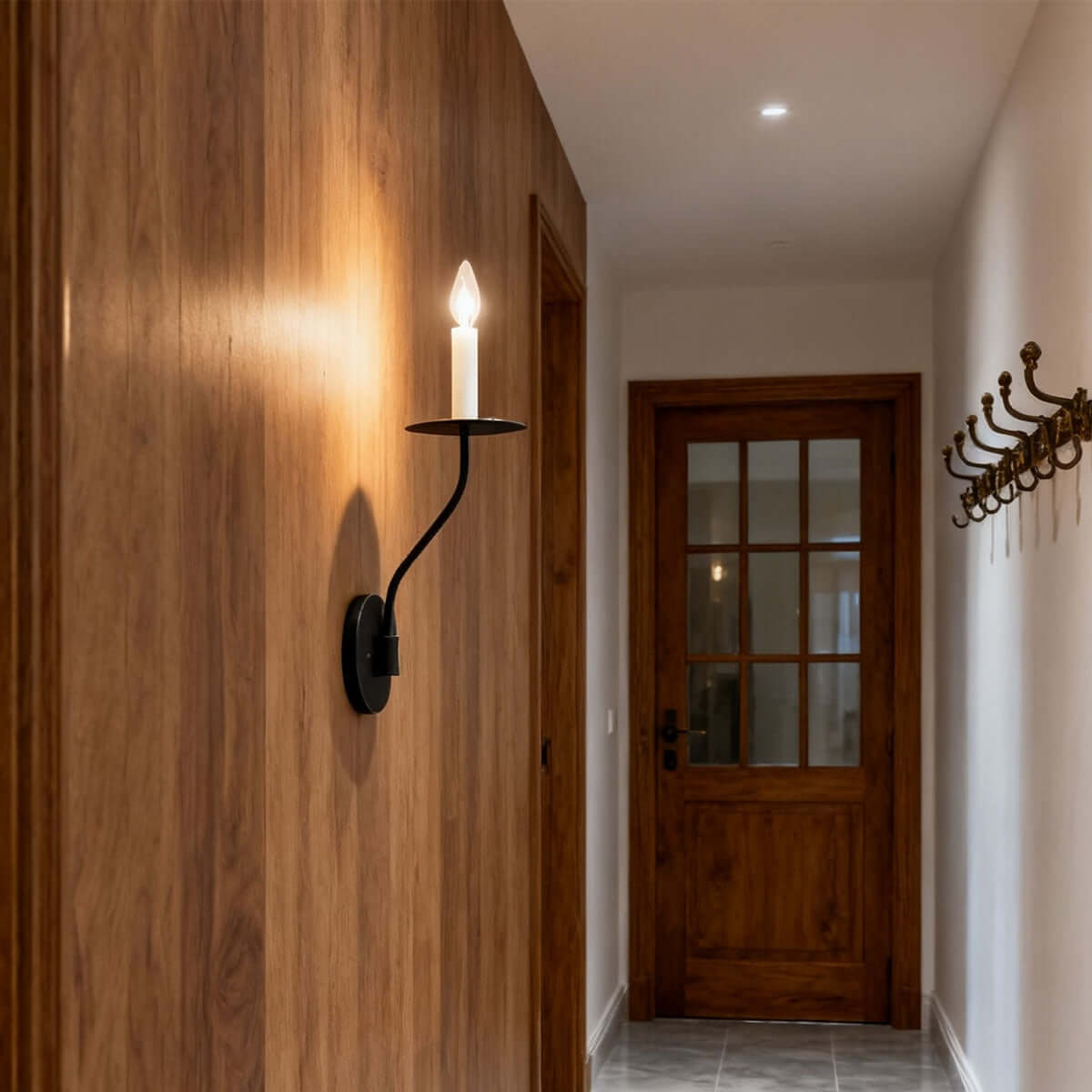 Messing wandlamp in kandelaarstijl