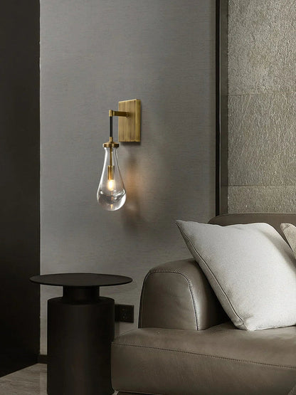 Wandlamp van traanvormig glas