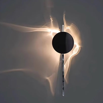 Sculpturale wandlamp met spiegelende schijf