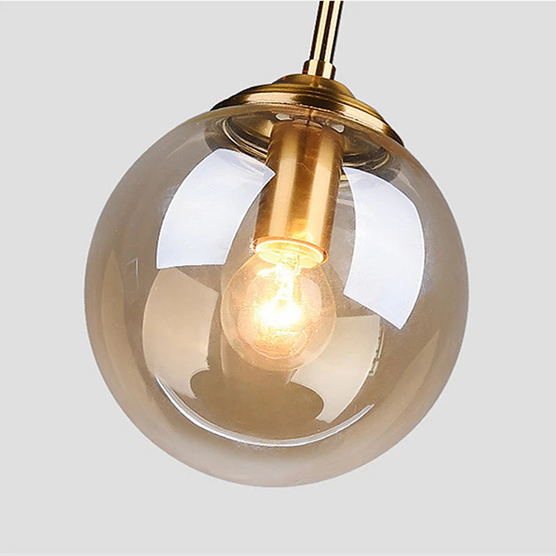 Orbelle Art-decoglazen hanglamp met messing bolvormige kap