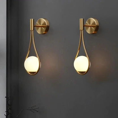 Orvenna Globe-wandlamp van ijzer in druppelvorm