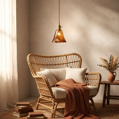Vintage messingkleurige hanglamp met amberkleurig glas