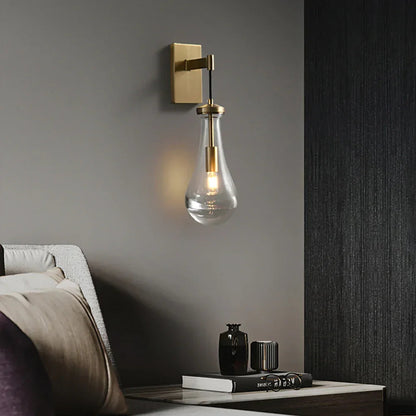Wandlamp van traanvormig glas