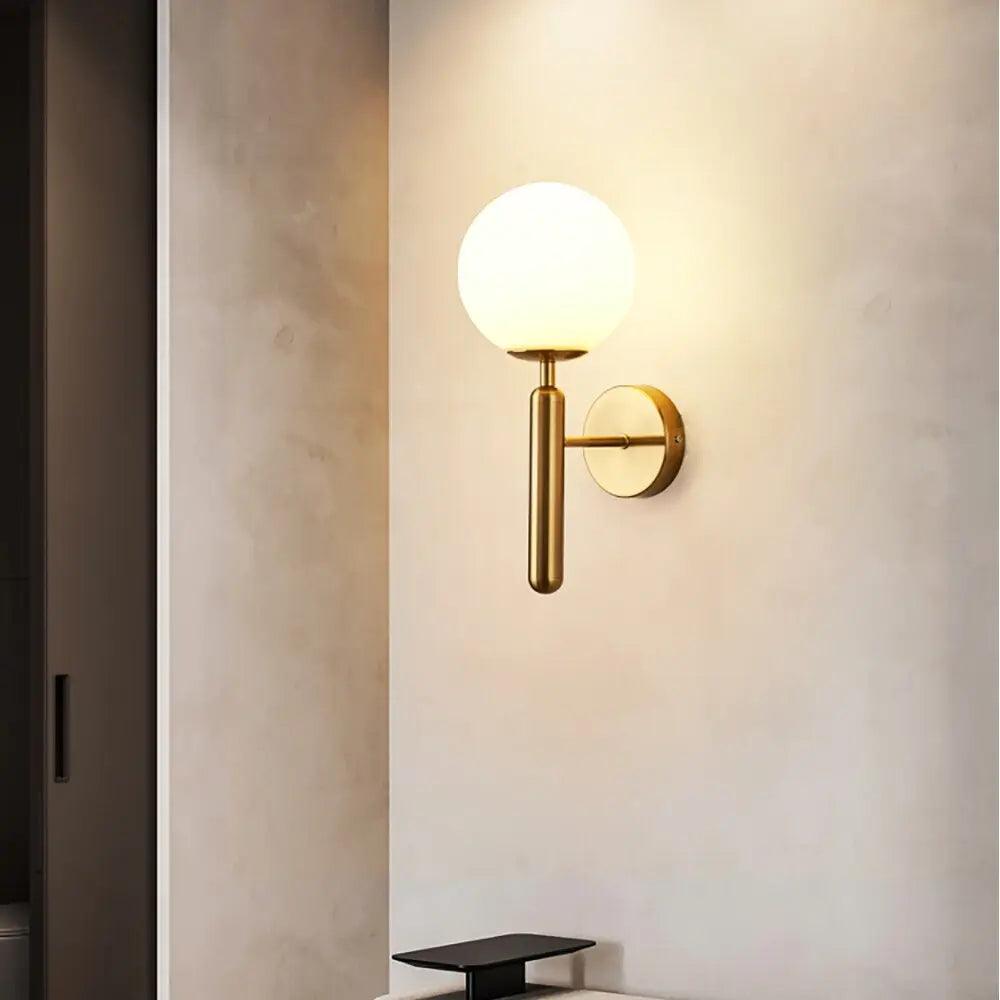 Ophira moderne wandlamp met glazen bol