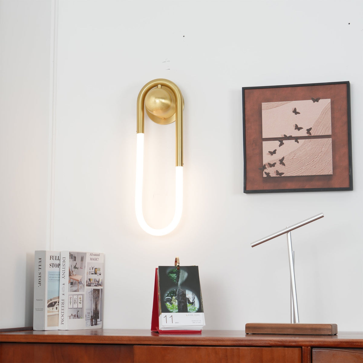 Ovale wandlamp van acrylbuis