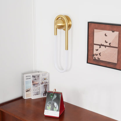 Ovale wandlamp van acrylbuis