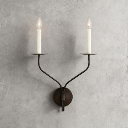 Messing wandlamp in kandelaarstijl