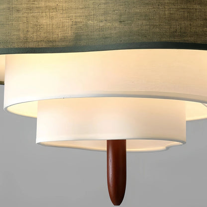 Gelaagde stoffen hanglamp van walnootkleurig hout