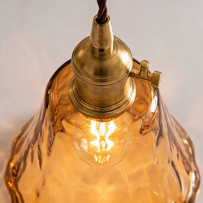 Vintage messingkleurige hanglamp met amberkleurig glas
