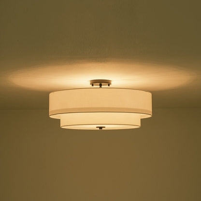 Half-inbouwlamp met witte linnen kap in trommelvorm