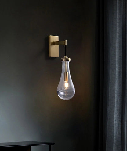 Wandlamp van traanvormig glas