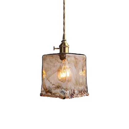 Vintage messingkleurige hanglamp met amberkleurig glas