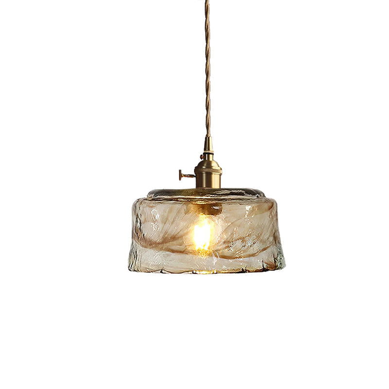 Vintage messingkleurige hanglamp met amberkleurig glas