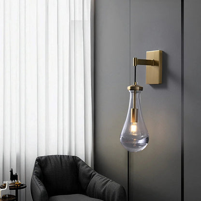 Wandlamp van traanvormig glas