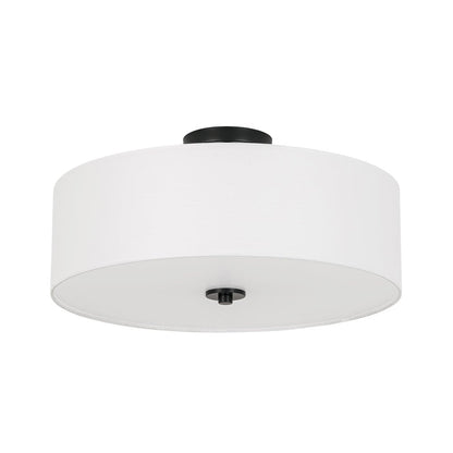Half-inbouwlamp met witte linnen kap in trommelvorm