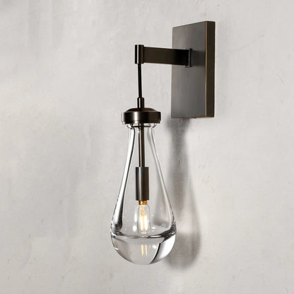 Wandlamp van traanvormig glas