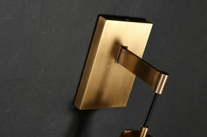 Wandlamp van traanvormig glas
