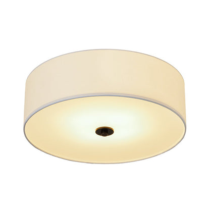 Half-inbouwlamp met witte linnen kap in trommelvorm
