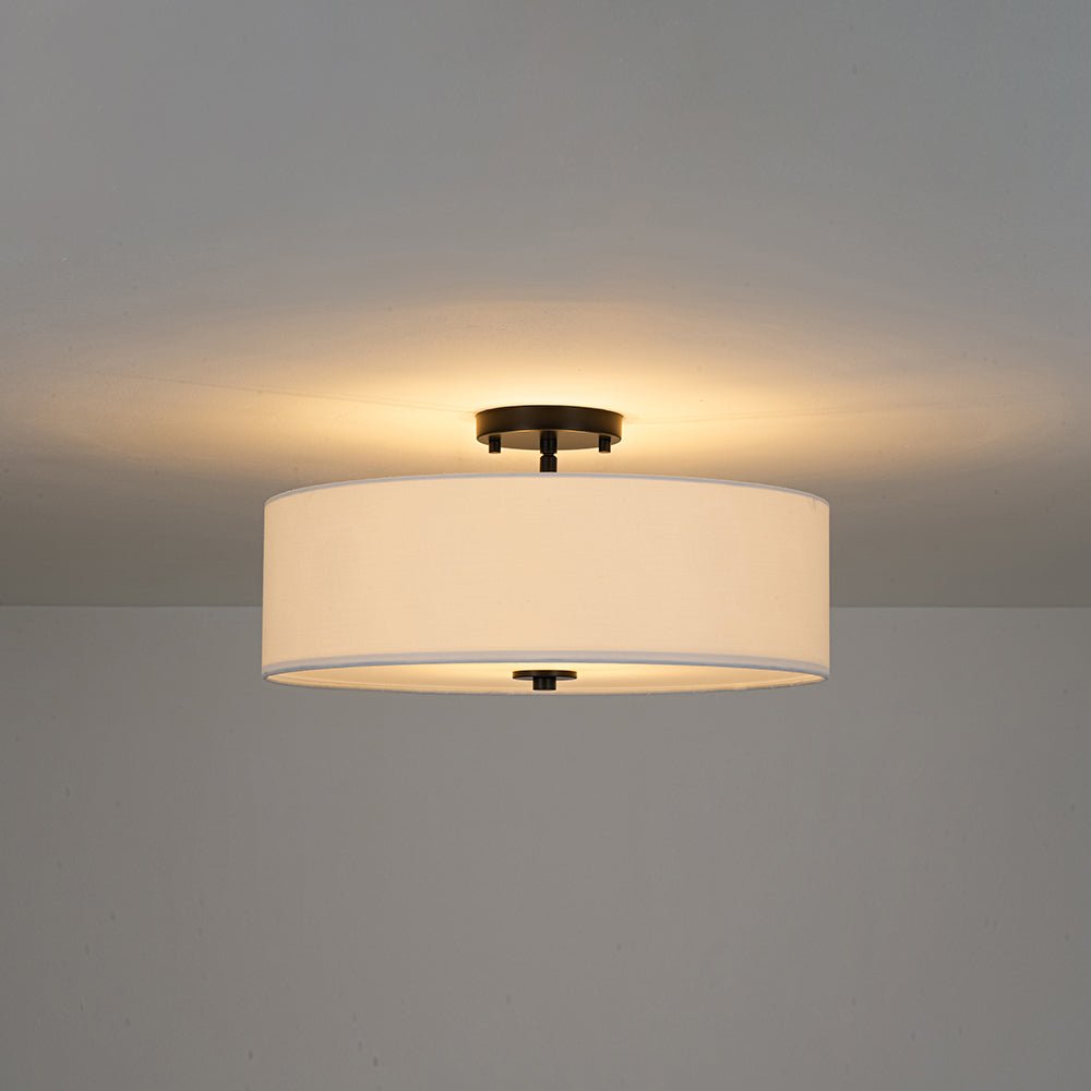 Half-inbouwlamp met witte linnen kap in trommelvorm