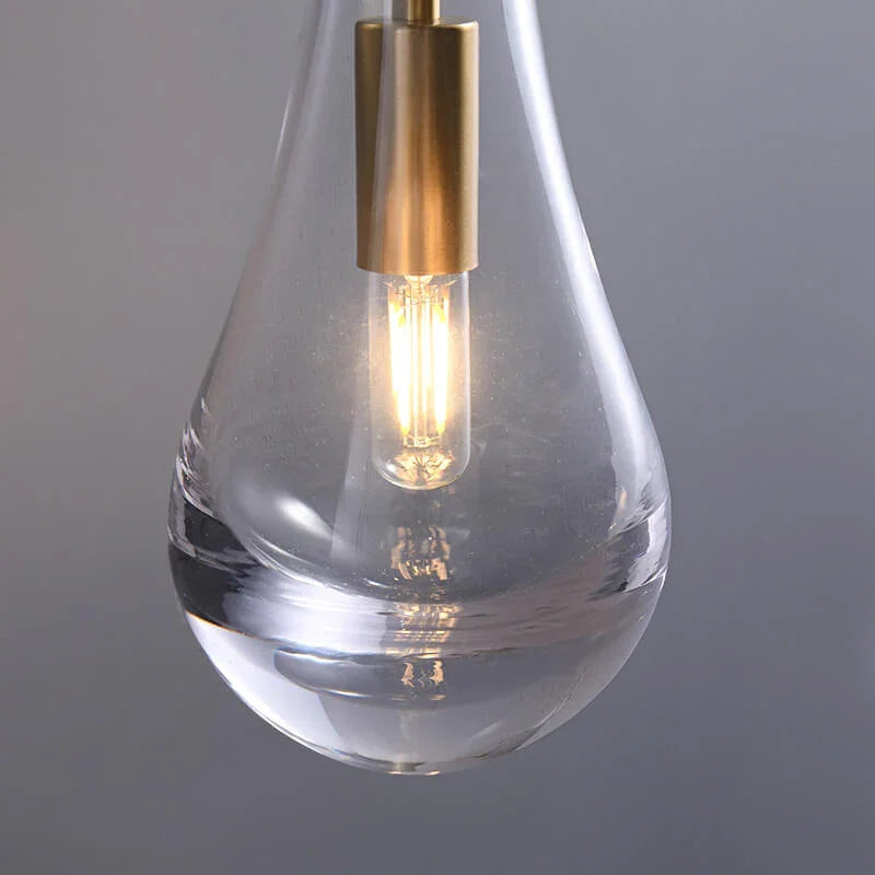 Wandlamp van traanvormig glas