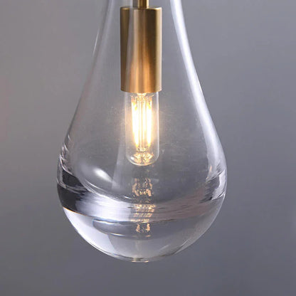 Wandlamp van traanvormig glas