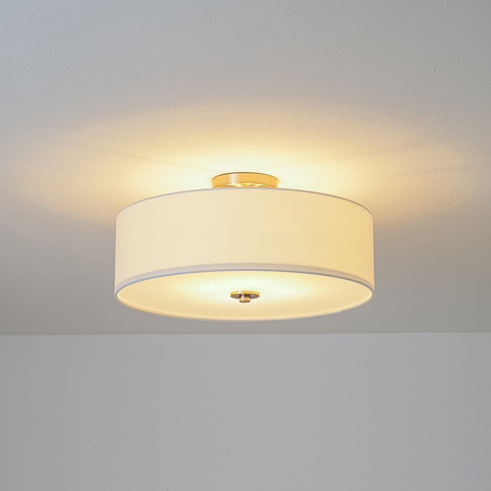 Half-inbouwlamp met witte linnen kap in trommelvorm