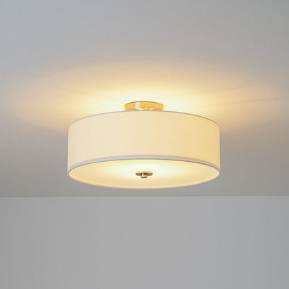 Half-inbouwlamp met witte linnen kap in trommelvorm