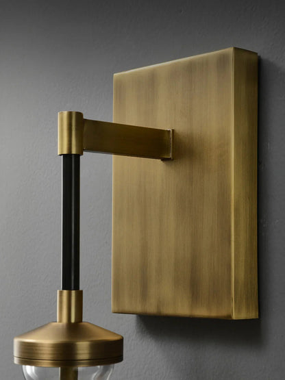 Wandlamp van traanvormig glas