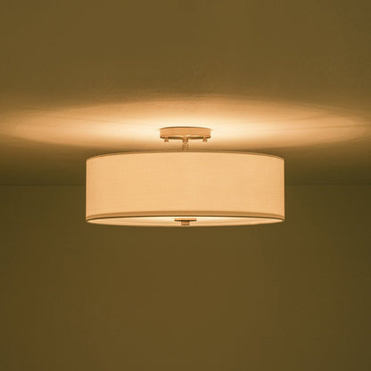 Half-inbouwlamp met witte linnen kap in trommelvorm