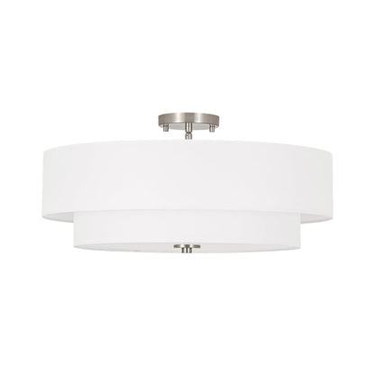 Half-inbouwlamp met witte linnen kap in trommelvorm