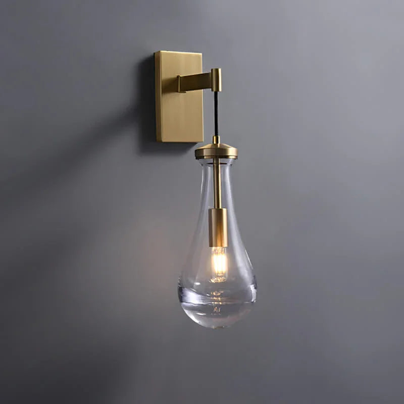Wandlamp van traanvormig glas