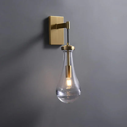 Wandlamp van traanvormig glas