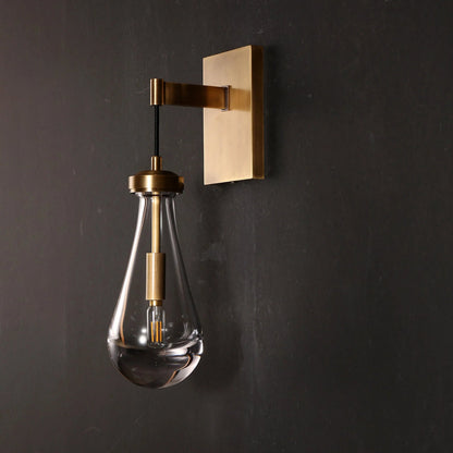 Wandlamp van traanvormig glas
