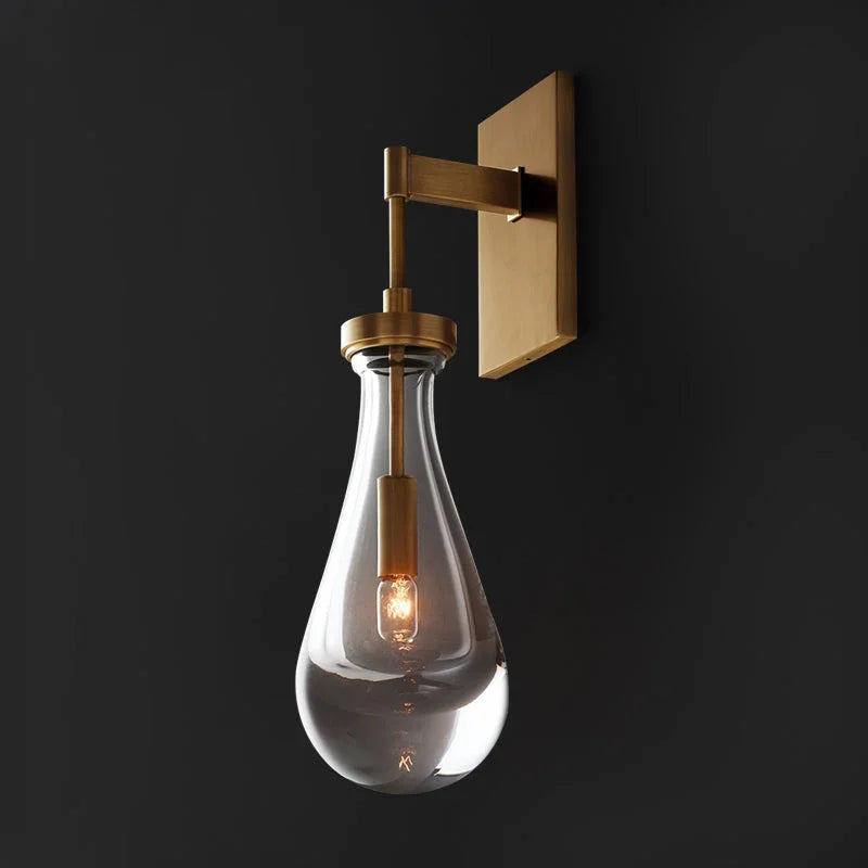Wandlamp van traanvormig glas