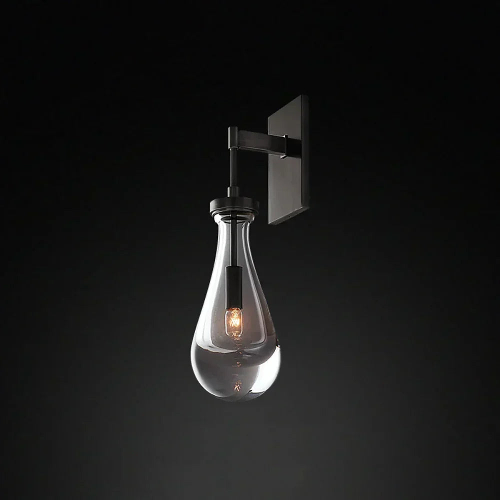 Wandlamp van traanvormig glas