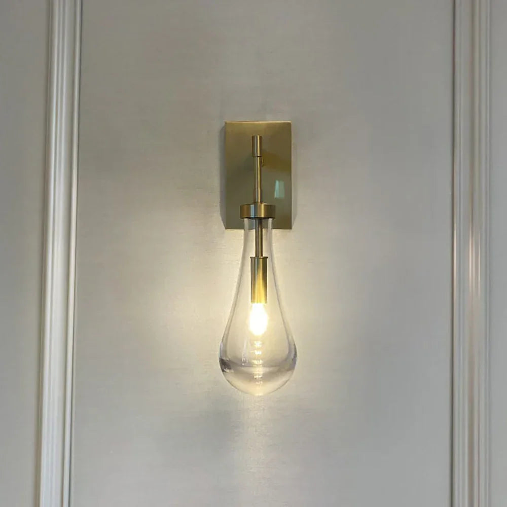 Wandlamp van traanvormig glas