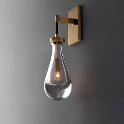 Wandlamp van traanvormig glas