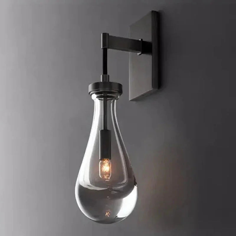 Wandlamp van traanvormig glas