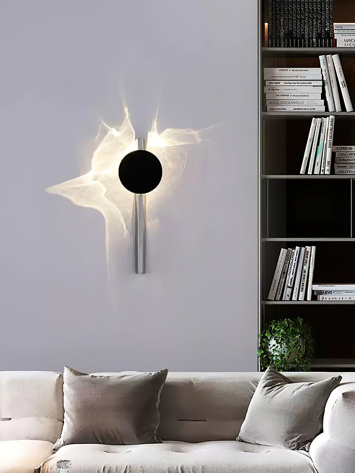 Sculpturale wandlamp met spiegelende schijf